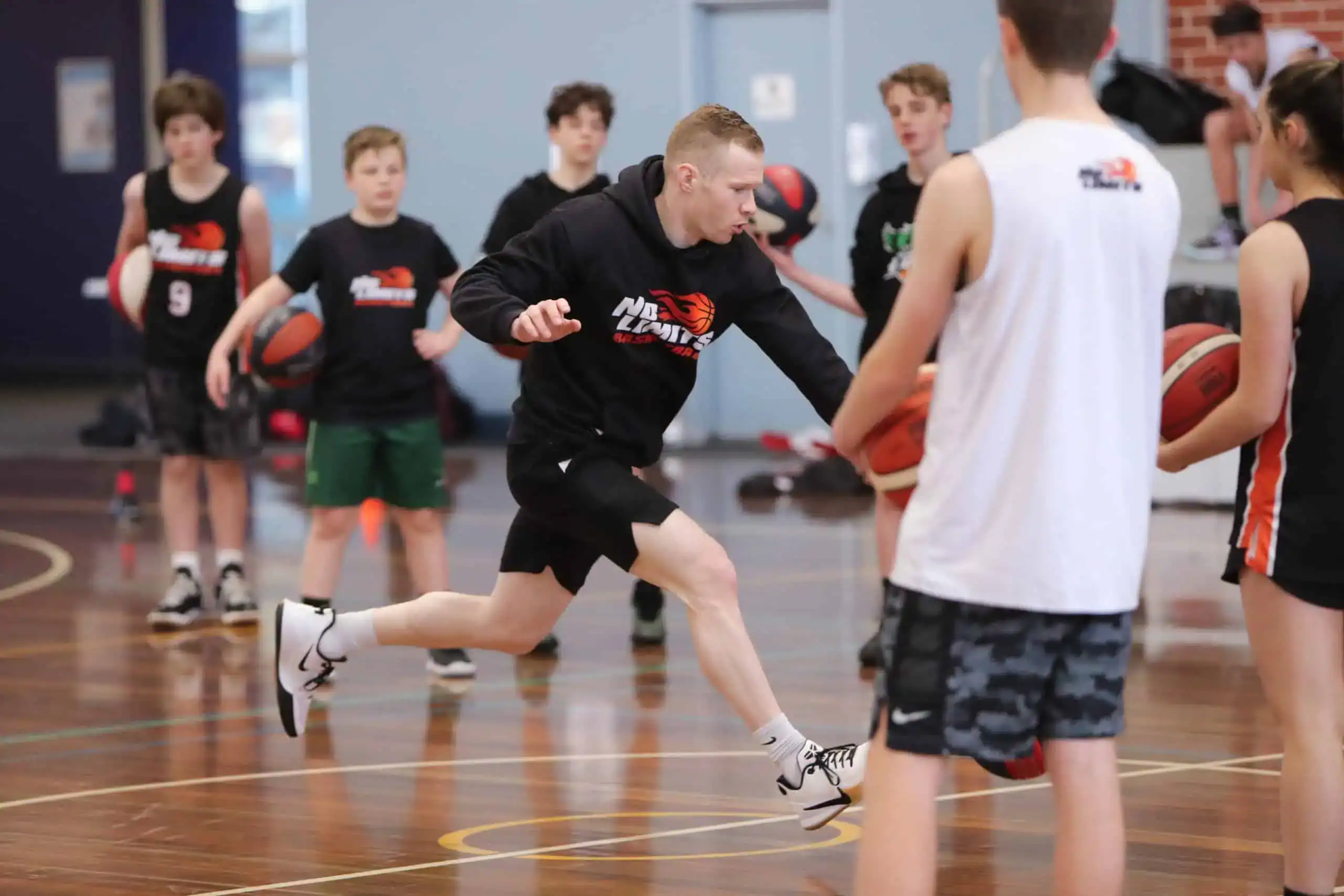 Young basketball players during training session at No Limits Basketball in Australia.