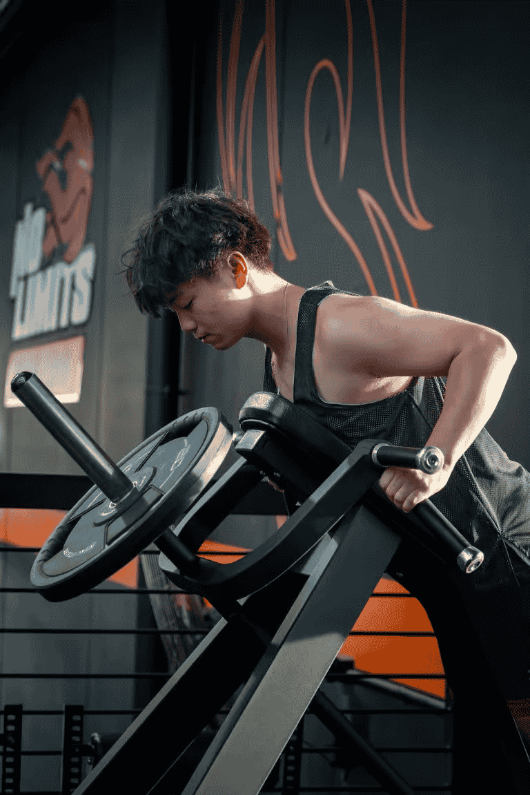 High school girl doing weight training at No Limits Basketball gym in Australia.