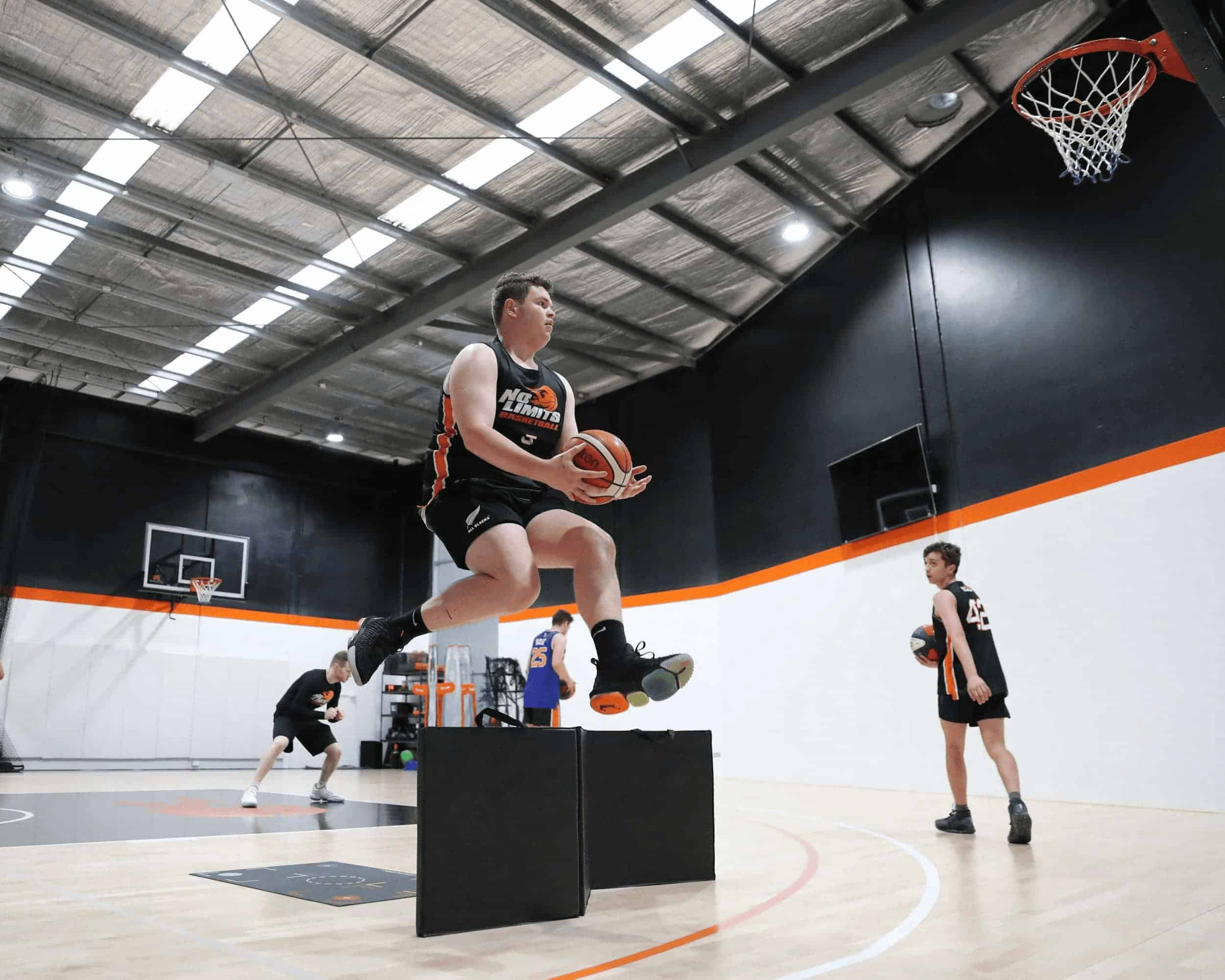 Youth basketball training at No Limits Basketball in Australia, focusing on skills development and fitness.
