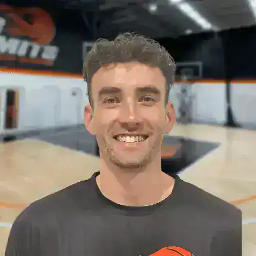 Smiling basketball player at No Limits Basketball gym in Australia.